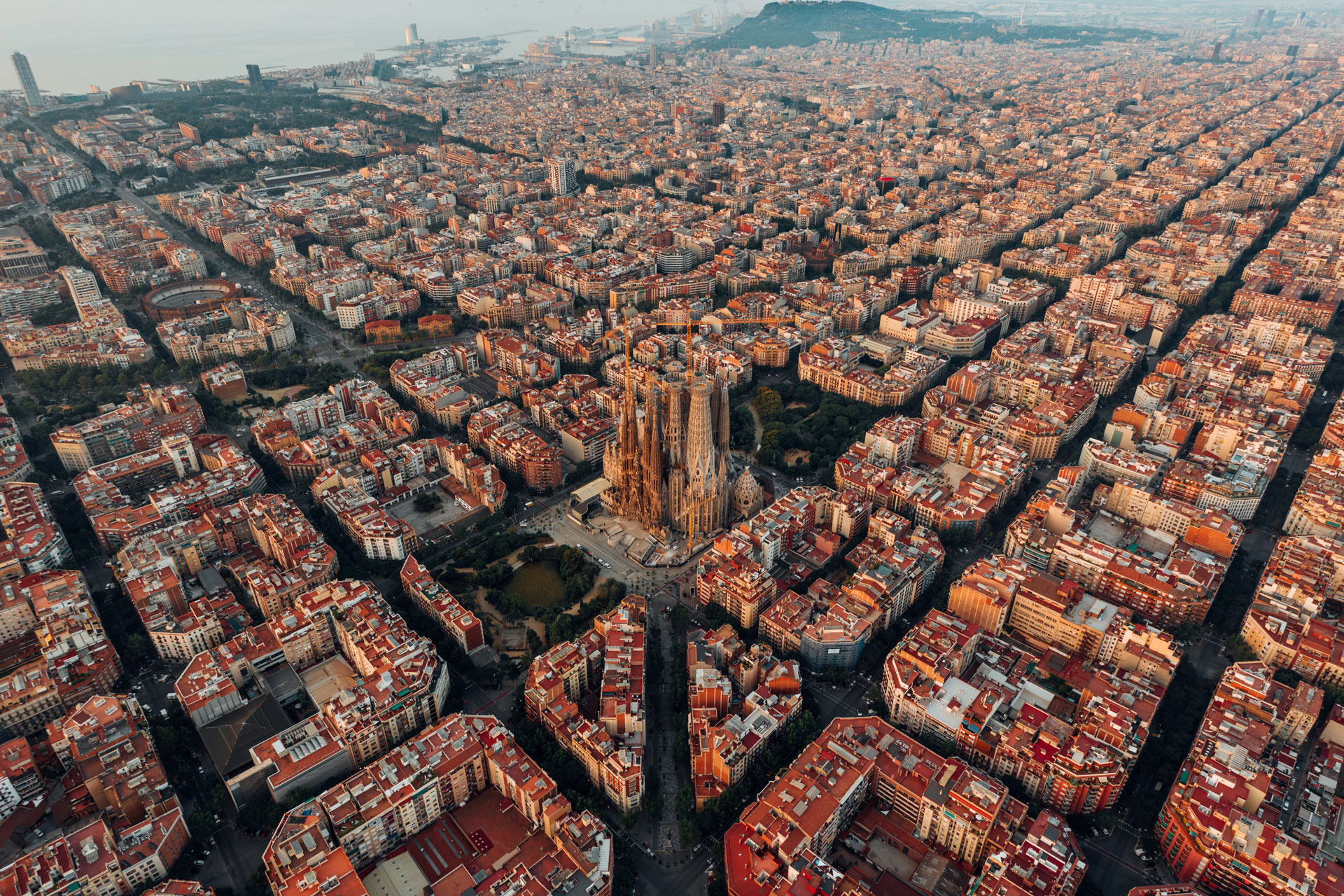 birds eye view of barcelona, la sagrada familia in centre, blocks surrounding